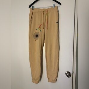 Jordan Tan Sweatpants with Multicolor Jumpman and Neon Drawcord